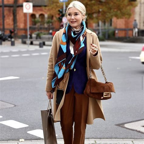 how to wear a hermes silk scarf|hermes scarf street style.